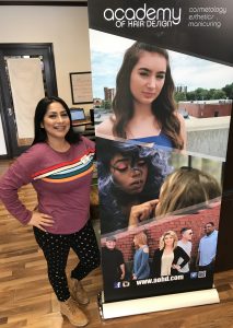 campus recruiter Frances Stallcup with AOHD sign